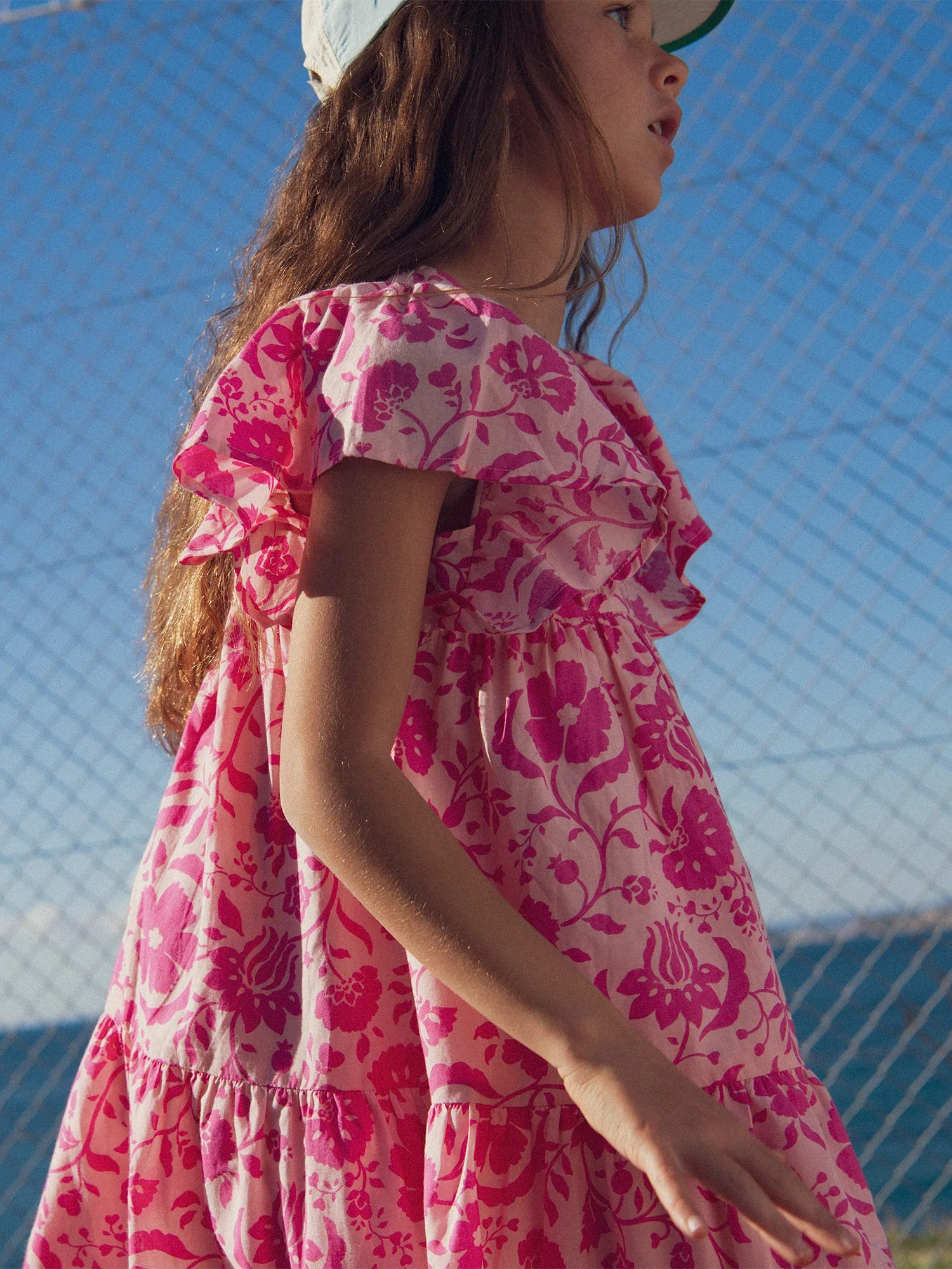 Abito rosa con stampa floreale per bambine - Image 3